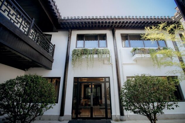 Xinhualian Lvxingu Hotel - Photo2