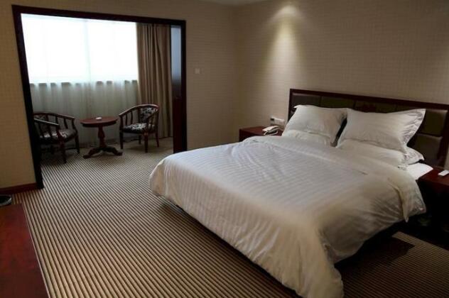 Huanyu Hotel Wuxi Baolong - Photo5