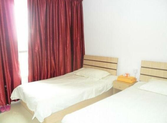 Jiu Long apartment hotel - Photo5