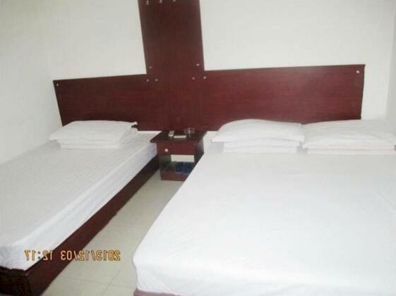 Family Hotel Xijing Apartment - Photo3