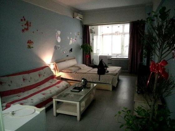 Zhumeng Apartment Hotel - Photo4