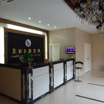 Xinyi Holiday Hotel - Photo5