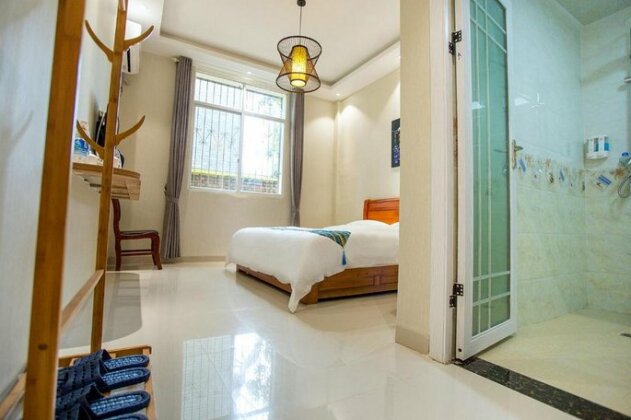Dai-Yue Style Holiday Hotel - Photo2