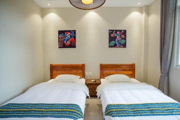 Dai-Yue Style Holiday Hotel - Photo3