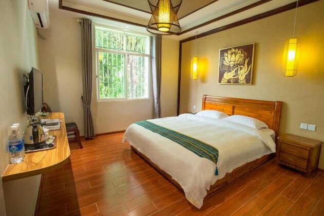 Dai-Yue Style Holiday Hotel - Photo4