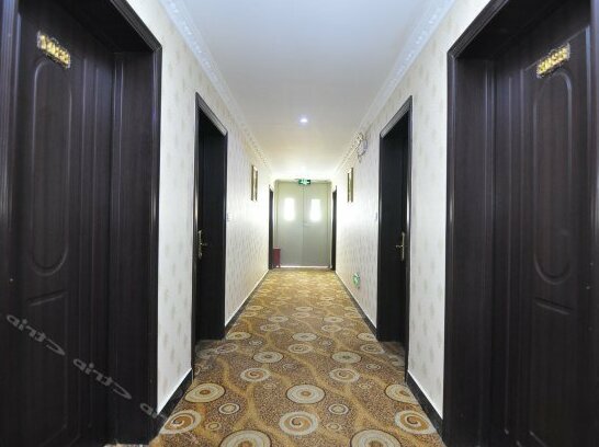 Tian Xin Hotel Jinghong - Photo4