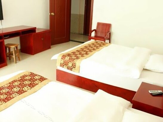 Tian Xin Hotel Jinghong - Photo5