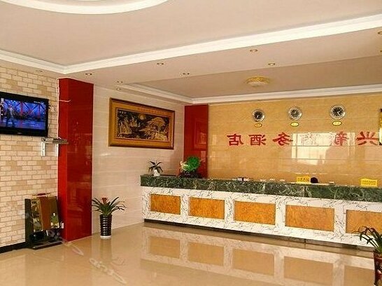 Xingxin Business Hotel Xishuangbanna - Photo3