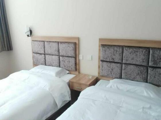 Saibei Business Hotel - Photo2