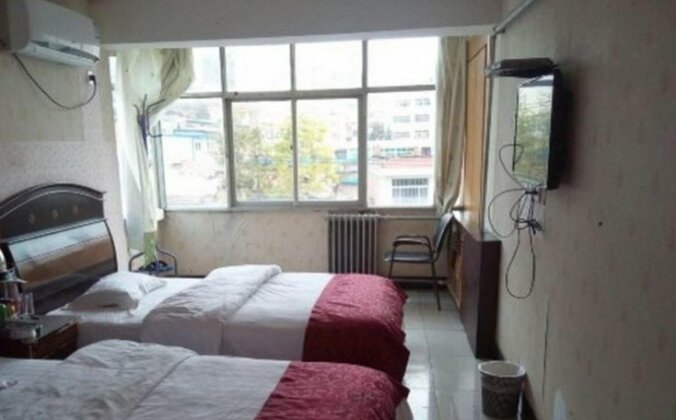 Zhengtian Hotel - Photo2