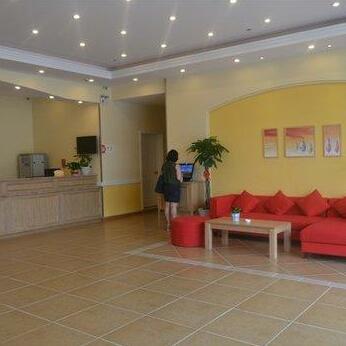 Home Inn Binhai Xin Ding International Plaza - Photo4