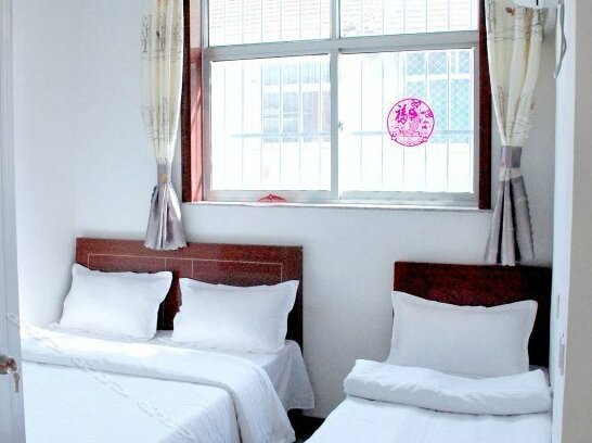 Shenghua Guesthouse - Photo5