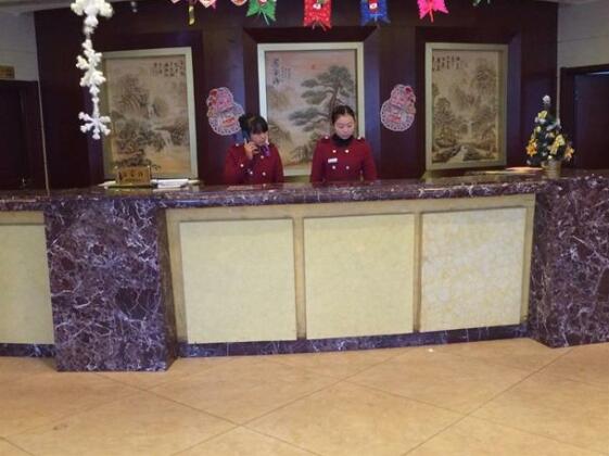 Hua Qi Hotel - Photo2