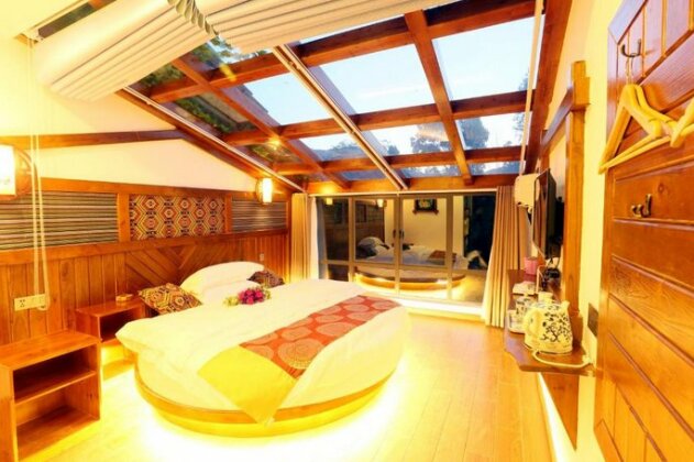 Taxiang Rumeng Guesthouse - Photo2