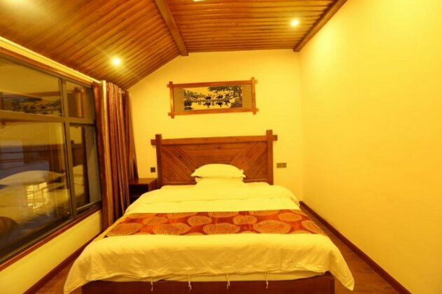 Taxiang Rumeng Guesthouse - Photo5