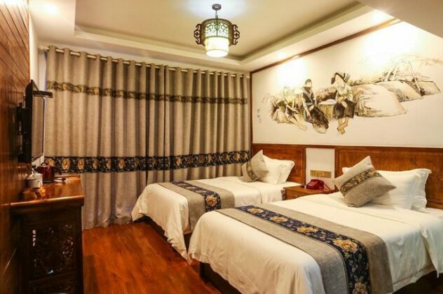 Tusi Courtyard Inn - Photo3