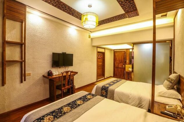 Tusi Courtyard Inn - Photo4