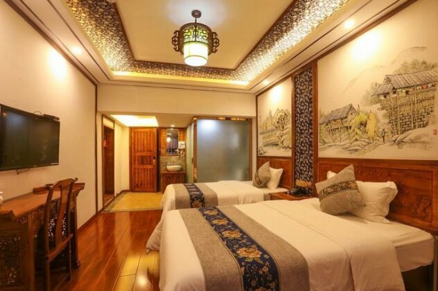 Tusi Courtyard Inn - Photo5