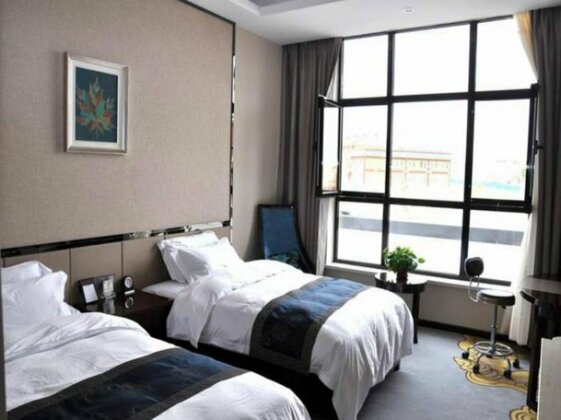 Linze Xinle Hotel - Photo2