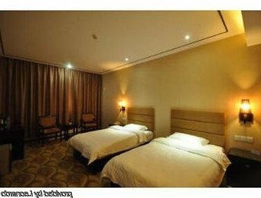 Super 8 Hotel Zhengzhou Weft Four Road - Photo3