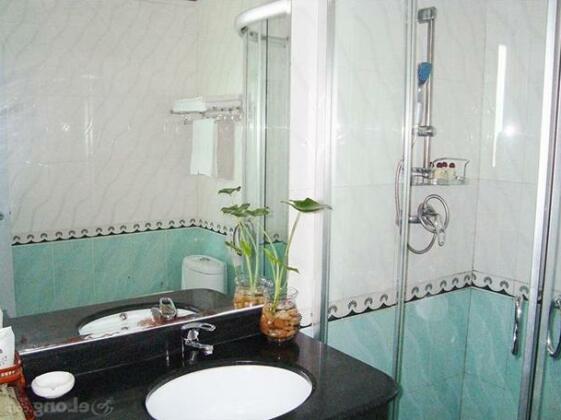 Gold Taizi Hotel - Photo4