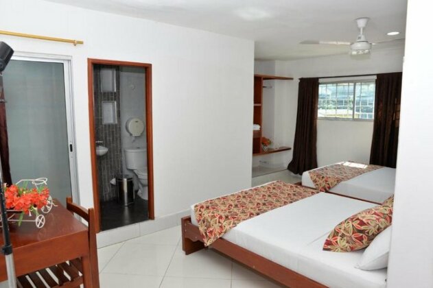 Hotel Canoa Inn - Photo2
