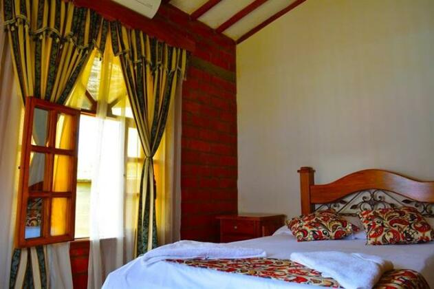 Hostal Valle De Las Camelias - Photo3