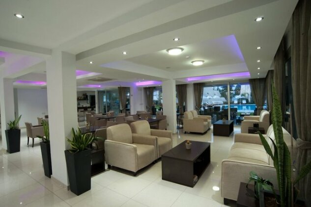 Frixos Suites Hotel Apartments - Photo4