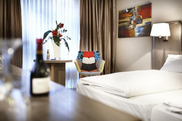 Hotel Dusseldorf City by Tulip Inn - Photo4