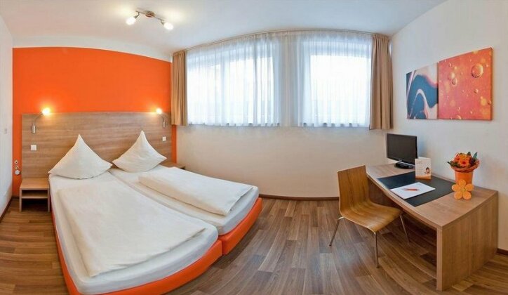 Orange Hotel und Apartments