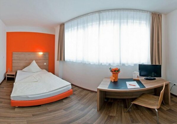 Orange Hotel und Apartments - Photo2