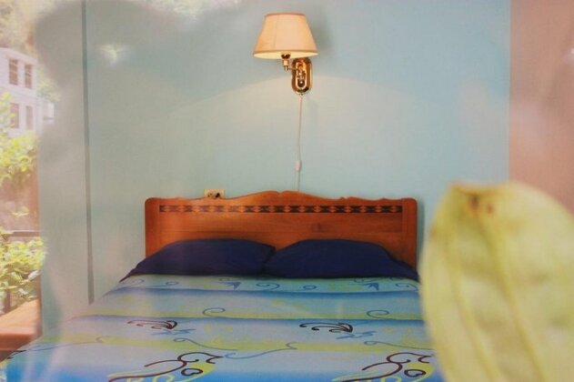 Kiwi Hostel & Suites Banos - Photo2