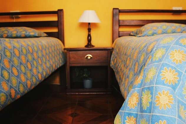 Kiwi Hostel & Suites Banos - Photo5