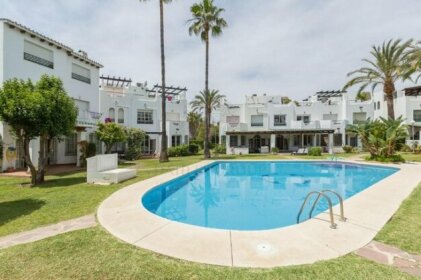 Nueva Andalucia Beach House by Dahlia Group