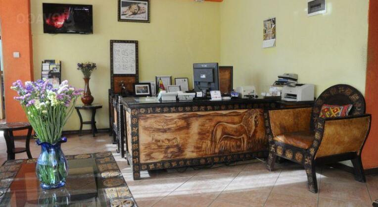 The lions den hotel - Photo4
