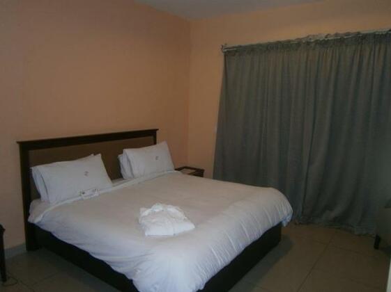 Hotel Central Franceville Heliconia - Photo4