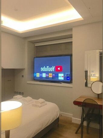 Trafalgar Luxury Suites - Photo5