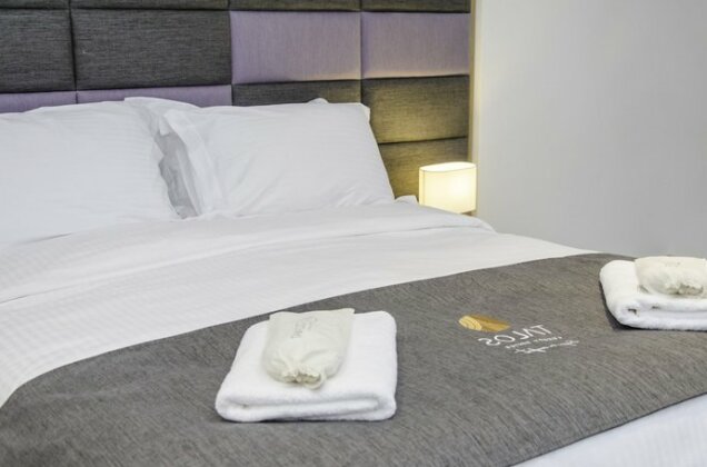 Talos Luxury Suites - Photo4