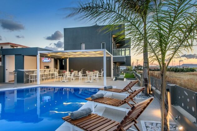 Elysian Suites - Photo2