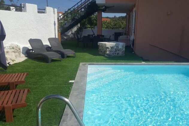 Aliki's Studio By A Shared Pool - Photo2