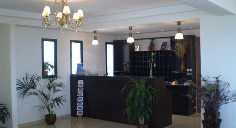 Roubini Apartments - Photo2