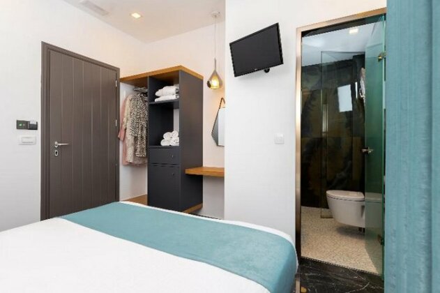 Deluxe Rest Boutique - Photo3