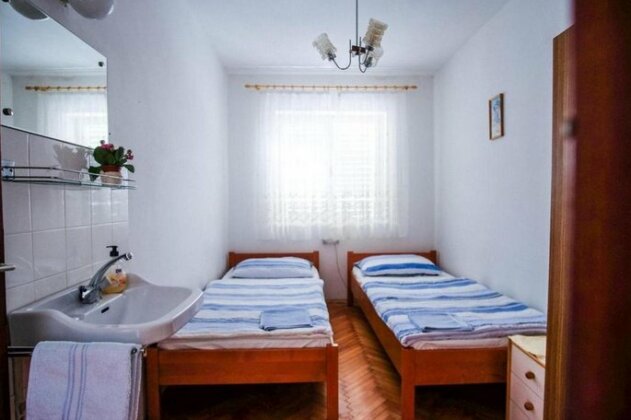 Apartments with a parking space Barbat Rab - 14431 - Photo2