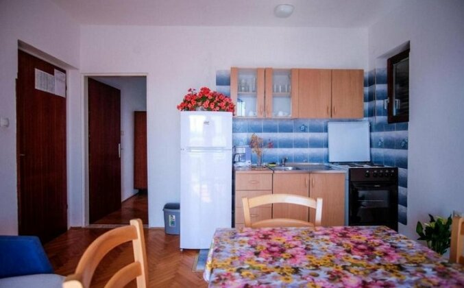 Apartments with a parking space Barbat Rab - 14431 - Photo5