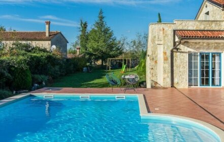 Newly built stone villa Mia with garden and pool
