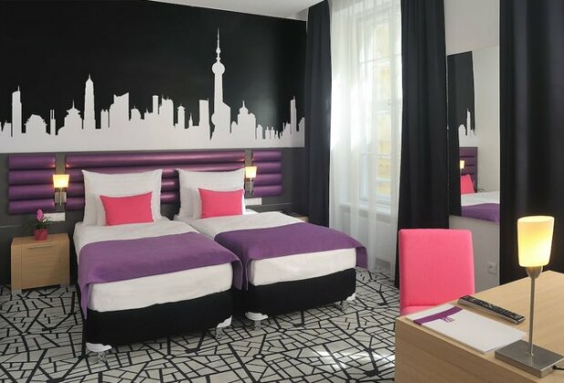 Cosmo City Hotel - Photo2