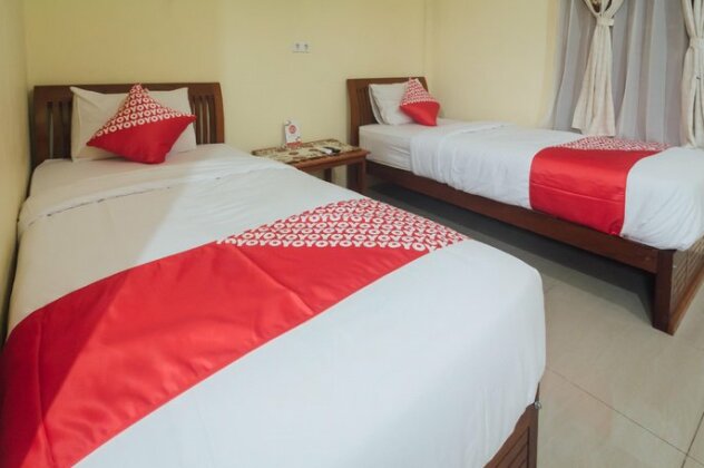 OYO 1300 Crecia Residence - Photo4