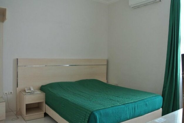 Grand Tulip Hotel - Photo4