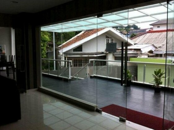 J Residence Hostel Ciumbuleuit - Photo3