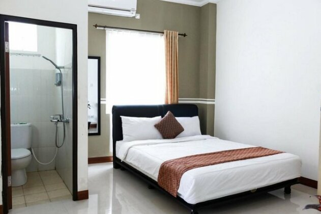 Zatarana Guest House Syariah - Photo4